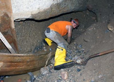 workers extract coupling