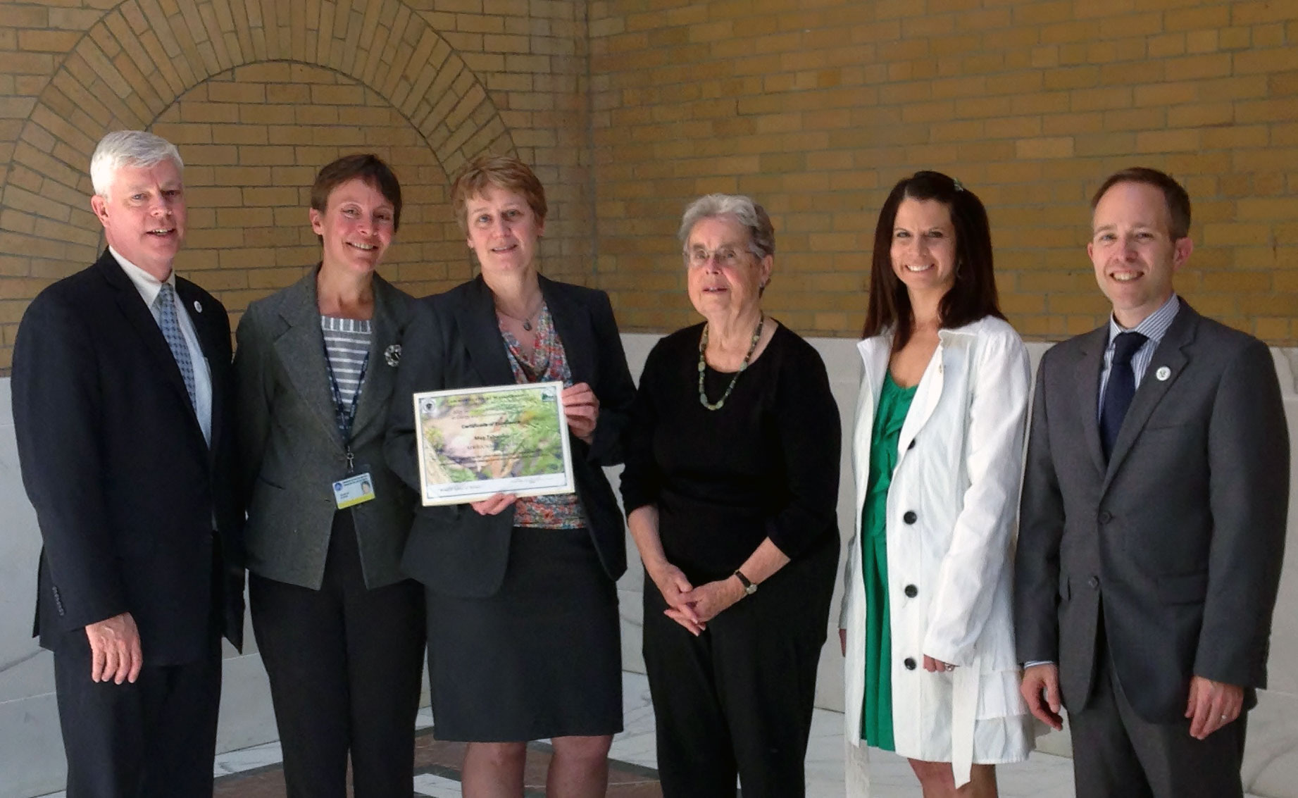 Secretary Richard Sullivan presented the MWRA's Education Program and Meg Tabacsko with the Secretary's Award for Excellence in Energy and Environmental Education, after WAC nominated her. Ria Convery, special assistant to the Executive Director, accepted the award for Meg.  Pictured (L-R): Secretary Sullivan, Andreae Downs, WAC executive director, Ria Convery,  WAC member Mary Adelstein, Mark Sylvia, commissioner of the Department of Energy Resources and Robin Organ, chair, Secretary's Advisory Group on Energy and Environmental Education.